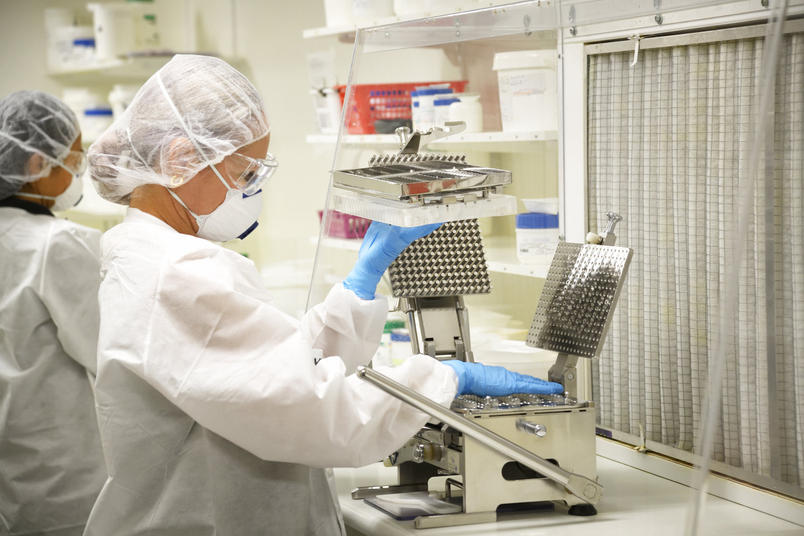 Pharmacists compounding in the Tugun Compounding Pharmacy lab